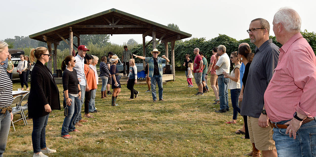 Participants line up for a dance lesson as part of the Tilth Farm Faire Saturday. (Carol Ladwig/Staff Photo)