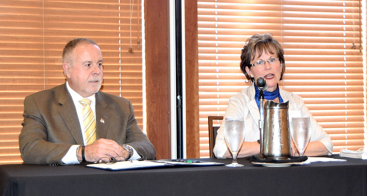 Candidates for King County Council, District 3, John Murphy and incumbent Kathy Lambert, took part in a candidate forum Sept. 27 at the Snoqualmie Valley Chamber of Commerce luncheon at The Club at Snoqualmie Ridge. (Carol Ladwig/Staff Photo)