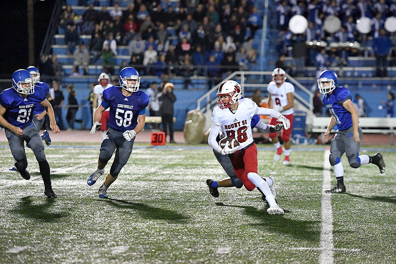 Jonny Barrett outruns his opponents at the game in Sedrow-Woolley on Sept. 29. (Photo Courtesy of Calder Productions)