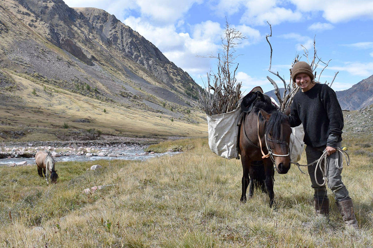 Zuniga used a horse to carry packs while her by a river. (Courtesy Photo)