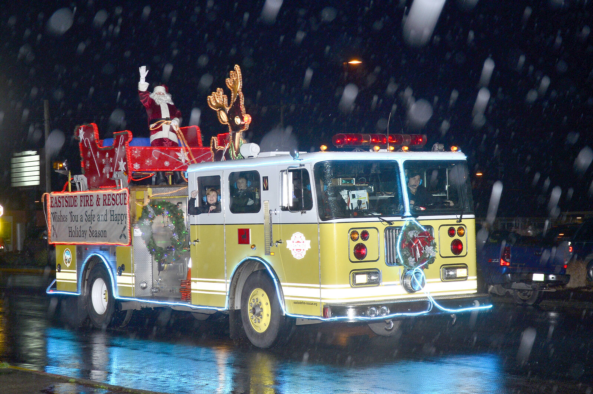 File photo                                An Eastside Fire and Rescue engine all lit up and bringing Santa into North Bend.