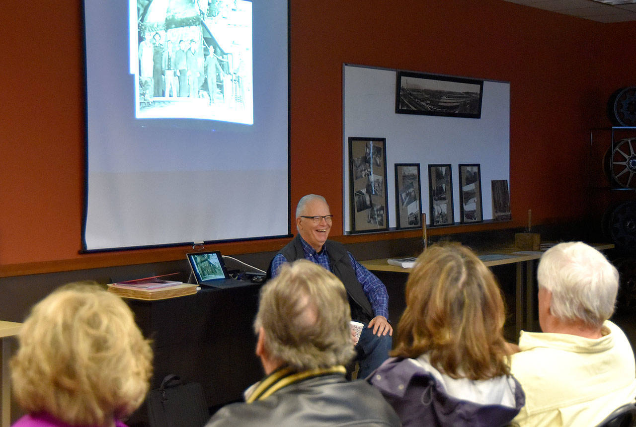 Historian Dave Battey laughs at stories shared during a celebration of the Snoqualmie Falls Lumber Company/Weyerhaeuser centennial. (Carol Ladwig/Staff Photo)