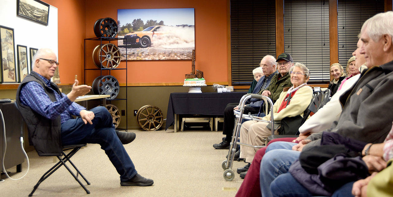 Dave Battey led a presentation Saturday on the history of the Snoqualmie Falls Lumber Company, which started at Snoqualmie Falls 100 years ago. (Carol Ladwig/Staff Photo)
