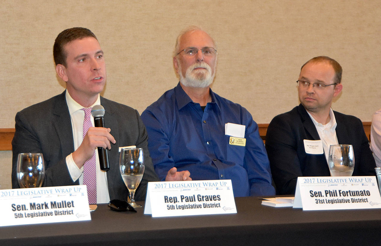Freshman State Representative Paul Graves, left, is pictured speaking at a September legislative wrap-up event with the Snoqualmie Valley Chamber of Commerce. This session, he plans to introduce a bill to remove an examption for state lawmakers from the state’s Public Records Act. (Carol Ladwig/File Photo)