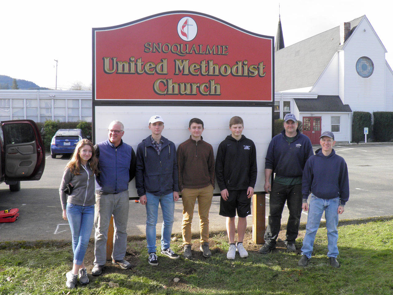 After 40 years, a new sign has been installed as part of an Eagle Scout project by Will Huestis. From left: Tess Huestis, Steve Huestis, Nick Steinrich, Will Huestis, Dawson Thomas, Mike Bateman, Wyatt Richeter. (Courtesy Photo)