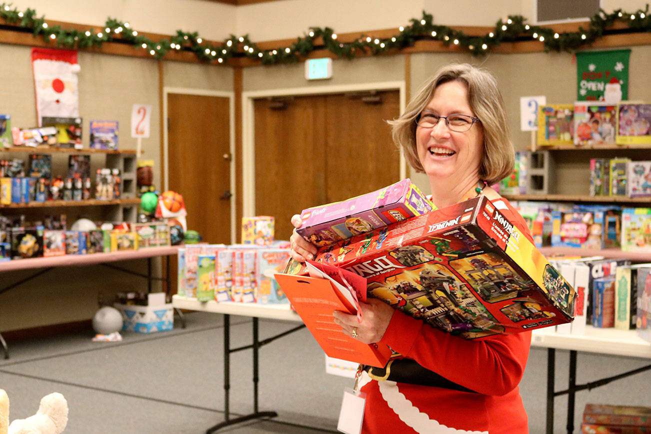 Holiday spirit headquarters: Giving Tree program wraps up with two-day shopping event at North Bend LDS church