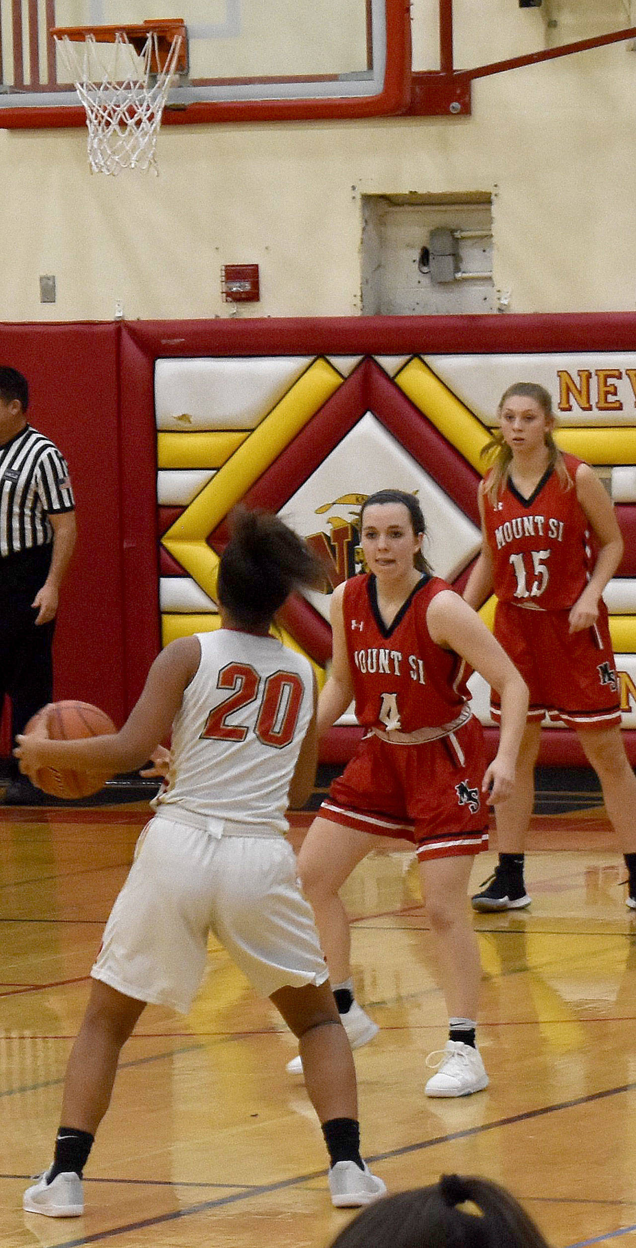 Jenae Usselman and Joelle Buck defend against a Newport scoring attempt. (Photo courtesy of Charles Samuelson)