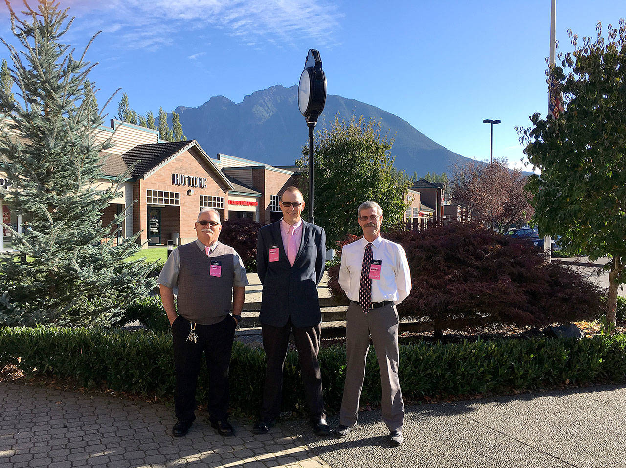 North Bend Premium Outlets management stands in the mall. From left: Operations Director Mike Matava, General Manager Ed Huebner, and Office Administrator Dave Prior. (Courtesy Photo)