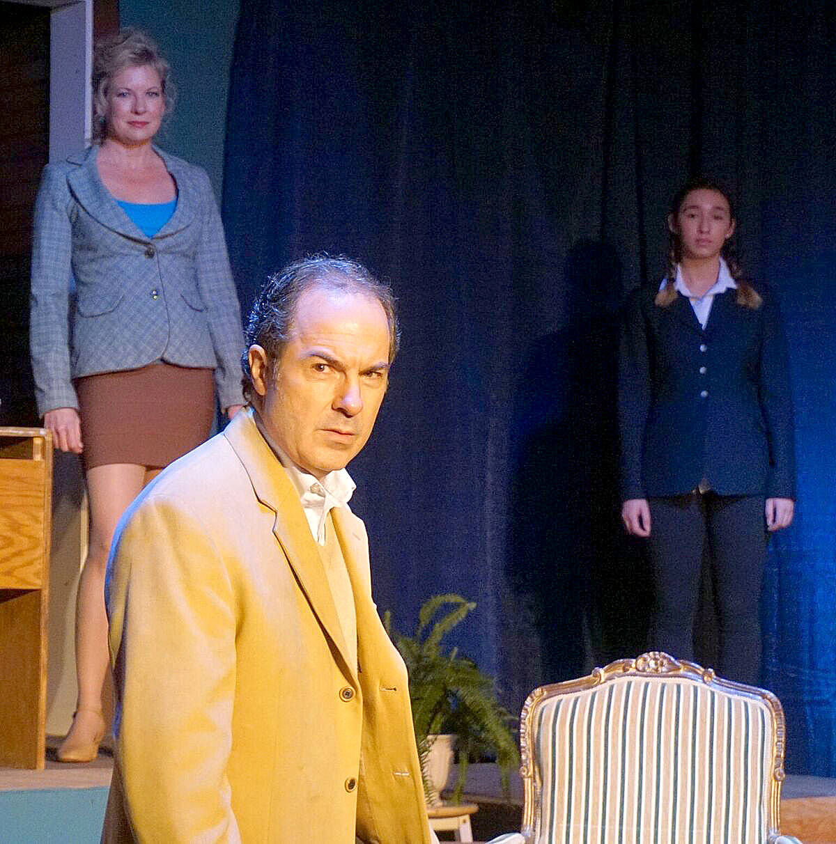 Real and imaginary women compete for Jake’s attention in a scene with Jenifer Gillis-Refenbery, left, playing Sheila, René Schuchter center, as Jake, and Bella Branson, right, as the memory of Jake’s daughter Molly at age 12. (Courtesy Photo)