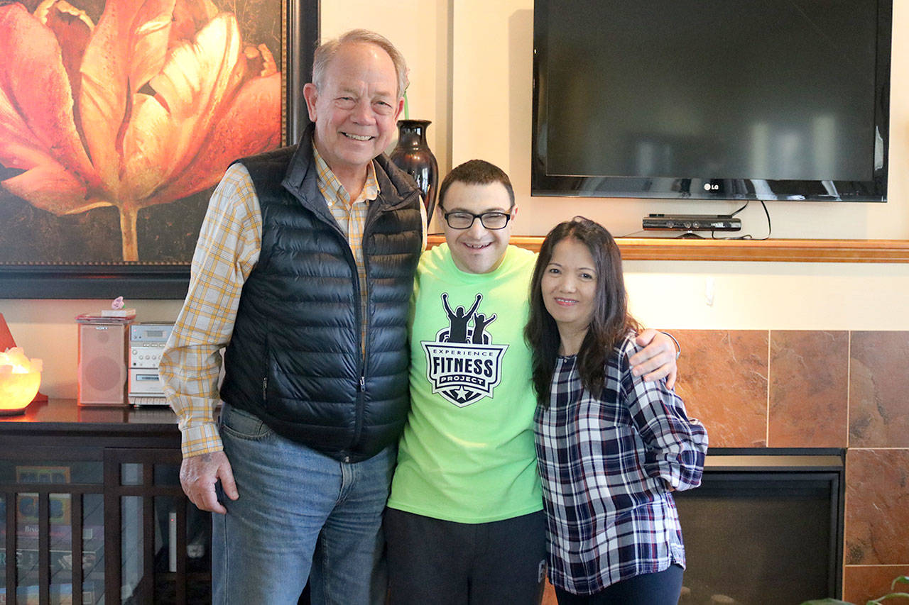 Life Enrichment Options Executive Director Fred Nystrom, resident Dylan Zeitlin, and care provider Evelyn Galasso. (Evan Pappas/Staff Photo)