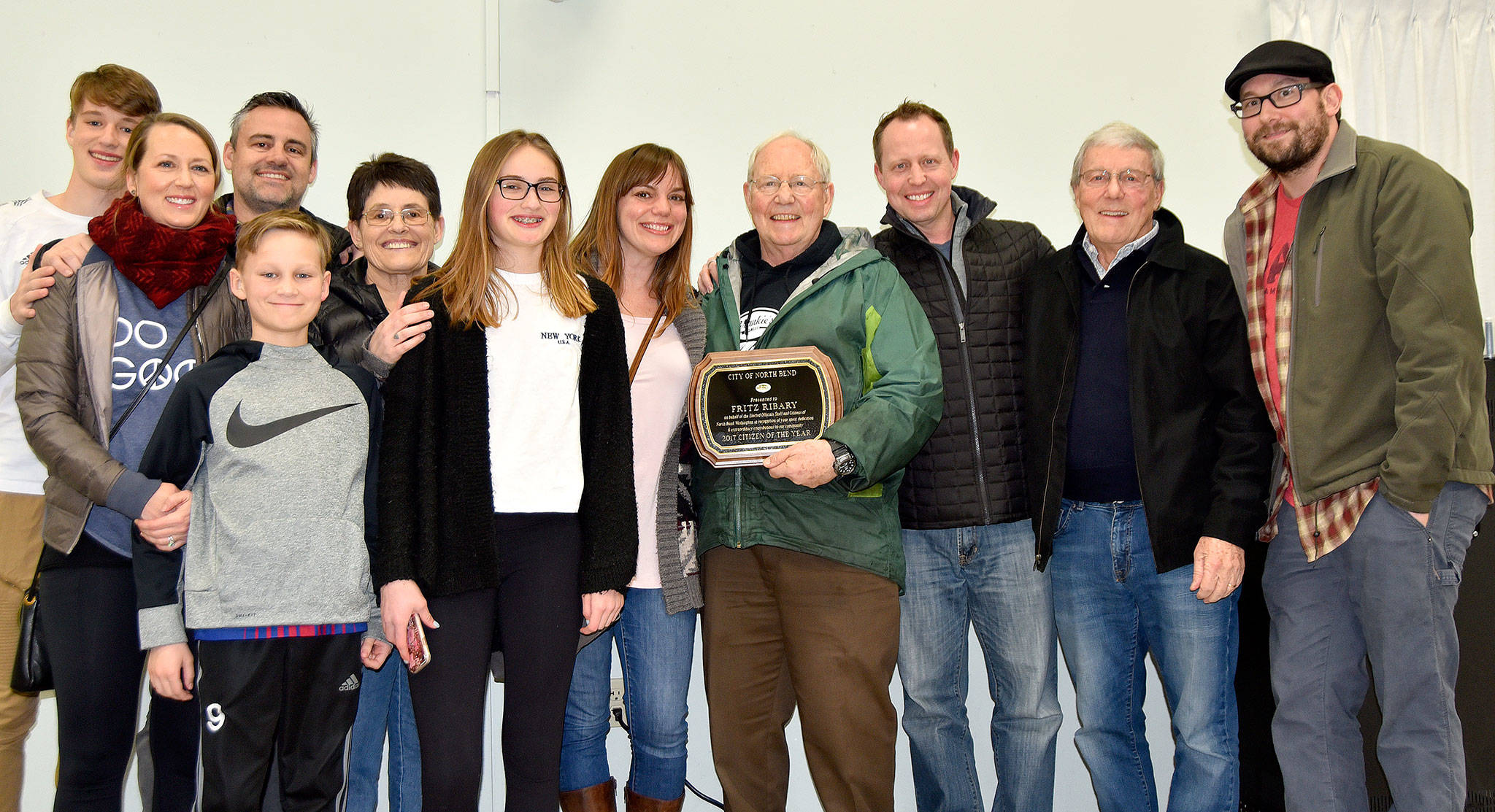Family members gather around Fritz Ribary to celebrate his award, 2018 North Bend Citizen of the Year. (Carol Ladwig/Staff Photo)