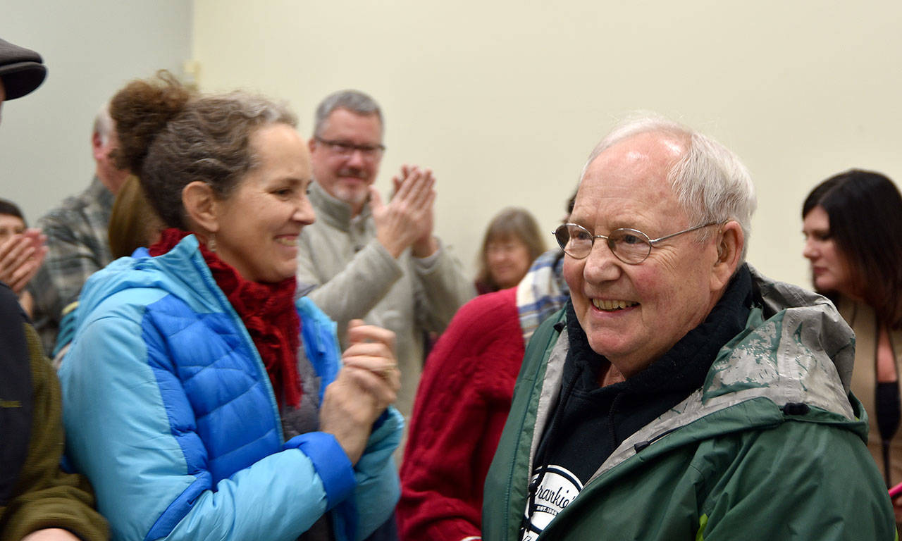 Fritz Ribary smiles as the large audience applauds the announcement that he is the North Bend Citizen of the Year. (Carol Ladwig/Staff Photo)