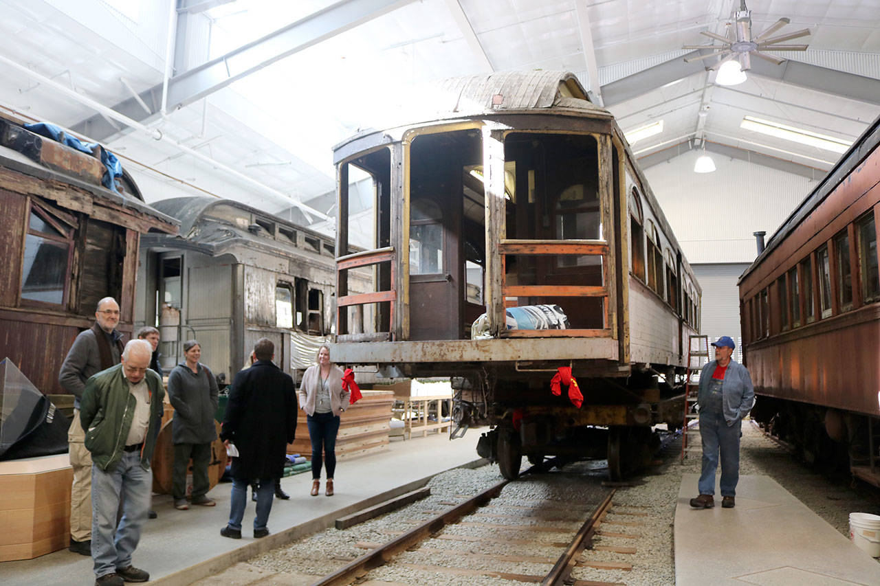 Event attendees check out the Interurban car 523 in the Train Shed Exhibit building. (Evan Pappas/Staff Photo)