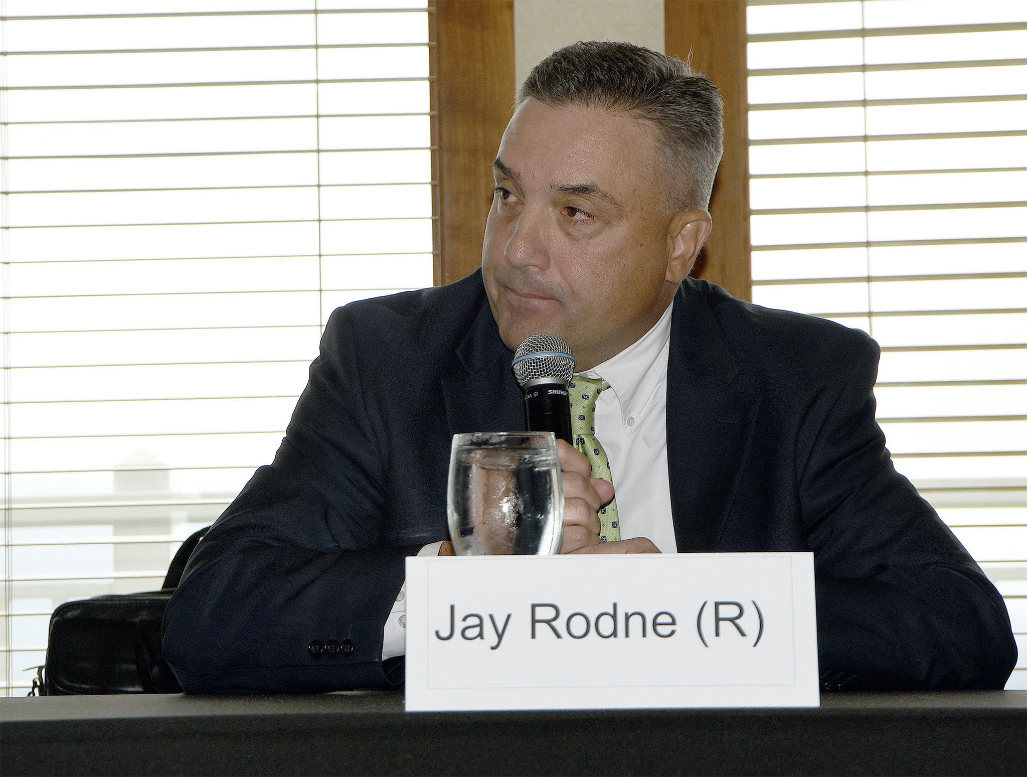Representative Jay Rodne, pictured speaking at a local candidate forum in 2016, announced Feb. 28 that he does not intend to seek re-election this year. (File Photo)