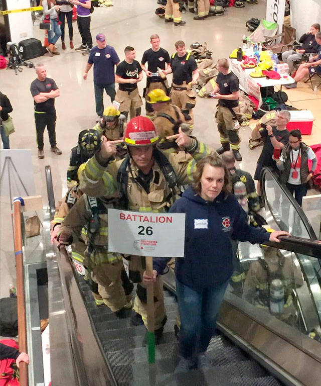 Firefighters on the climb - note escalators were not running at the time. Photo courtesy of the City of Snoqualmie