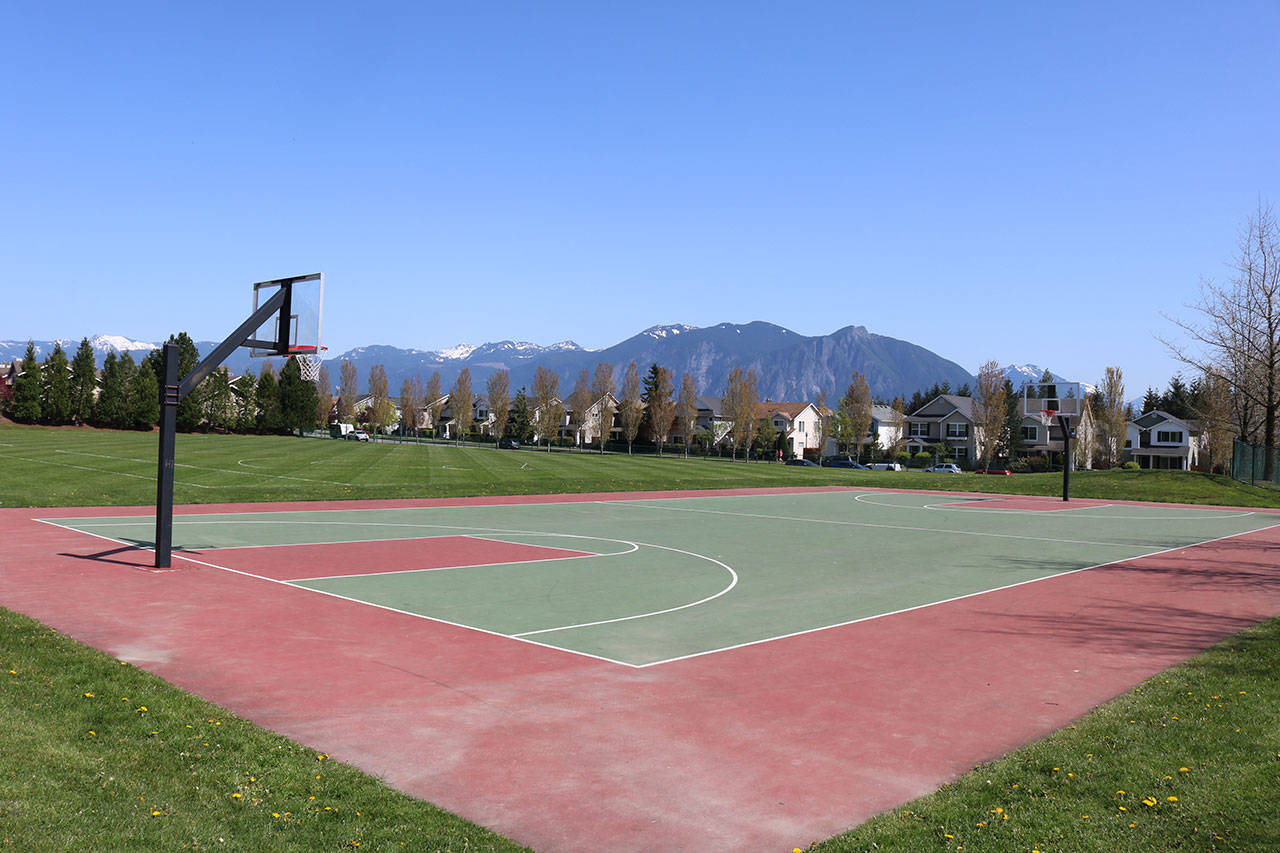 The Snoqualmie skate park will be located directly to the south of the existing basketball court and will offer sweeping views of nearby mountains. Aaron Kunkler/Staff photo