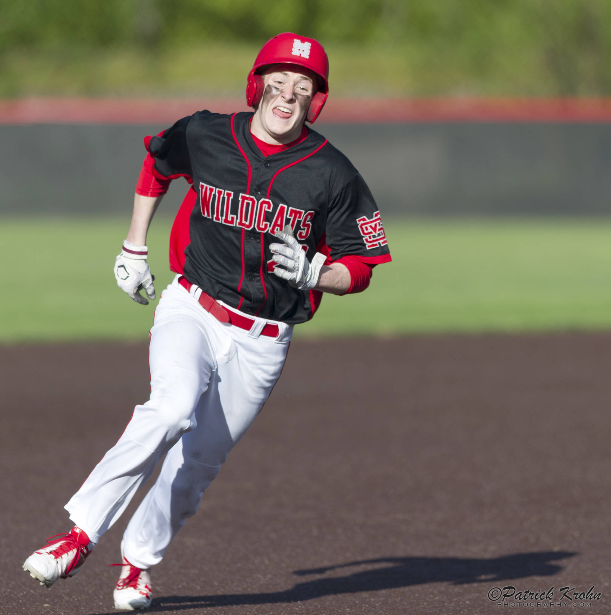 Photo courtesy of Patrick Krohn/Patrick Krohn Photography                                Mount Si Wildcats senior Logan Van Campen hustles to home-plate, scoring a run for his team in the top of the seventh inning. The Issaquah Eagles defeated the Mount Si Wildcats 8-4 in a loser-out, KingCo 4A playoff game on May 4 at Bannerwood Park in Bellevue.