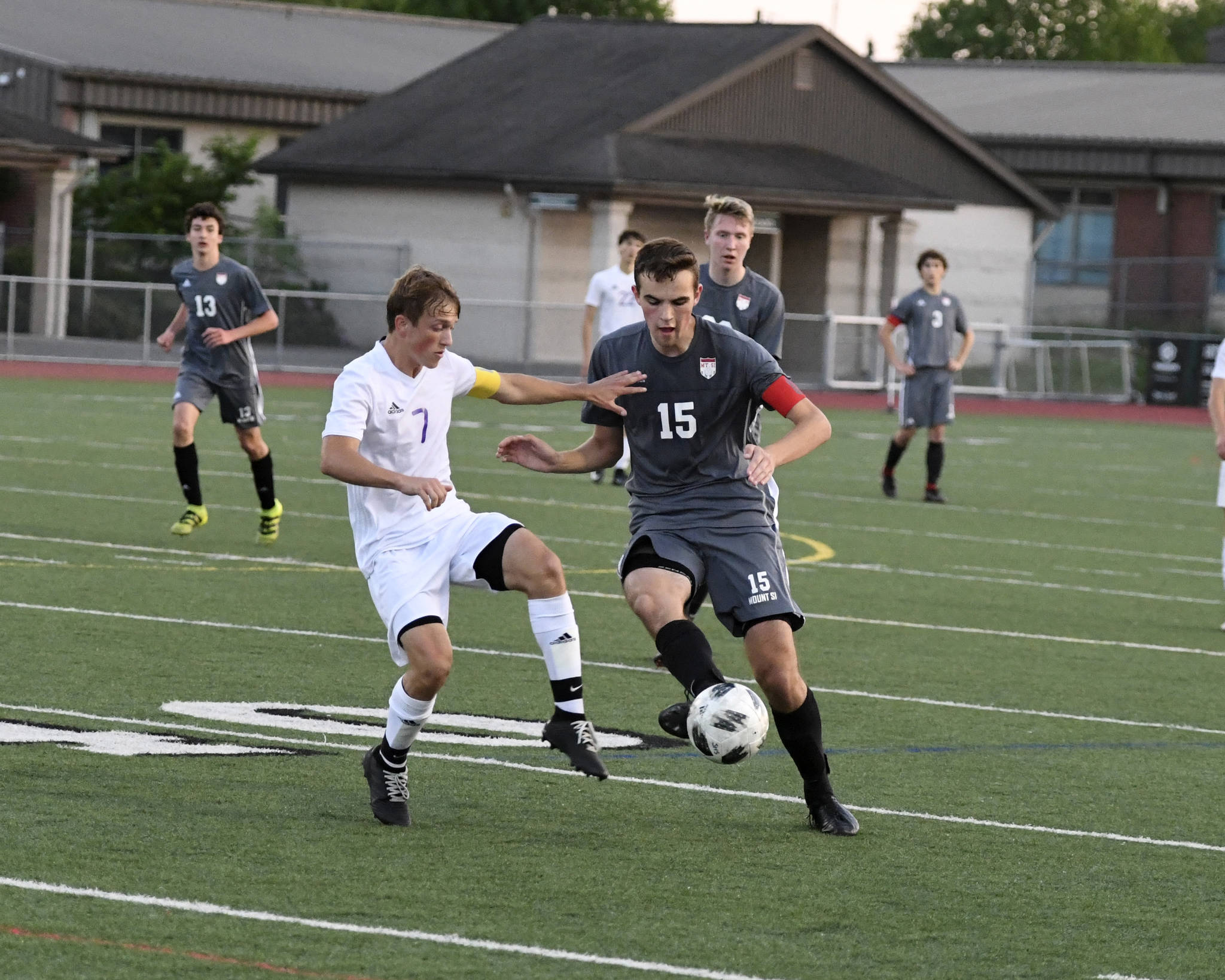 Photo courtesy of Calder Productions                                Mount Si senior forward Alec Bothwell, right, tries to maneuver around Sumner midfielder Ryan Griffith in the first round of the Class 4A state soccer playoffs on May 15 at Sunset Chev Stadium in Sumner.