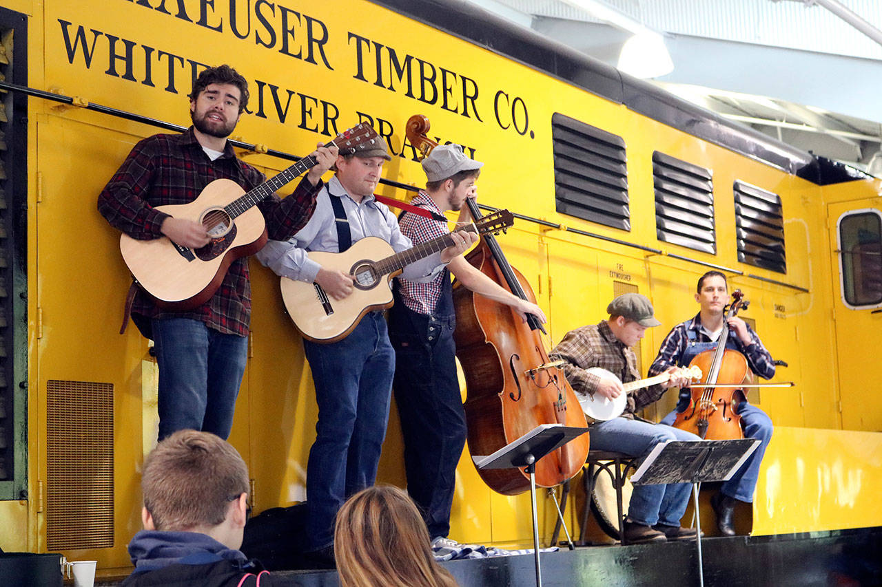 Local band Tinkham Road play inside the train shed at previous show. Reporter File Photo