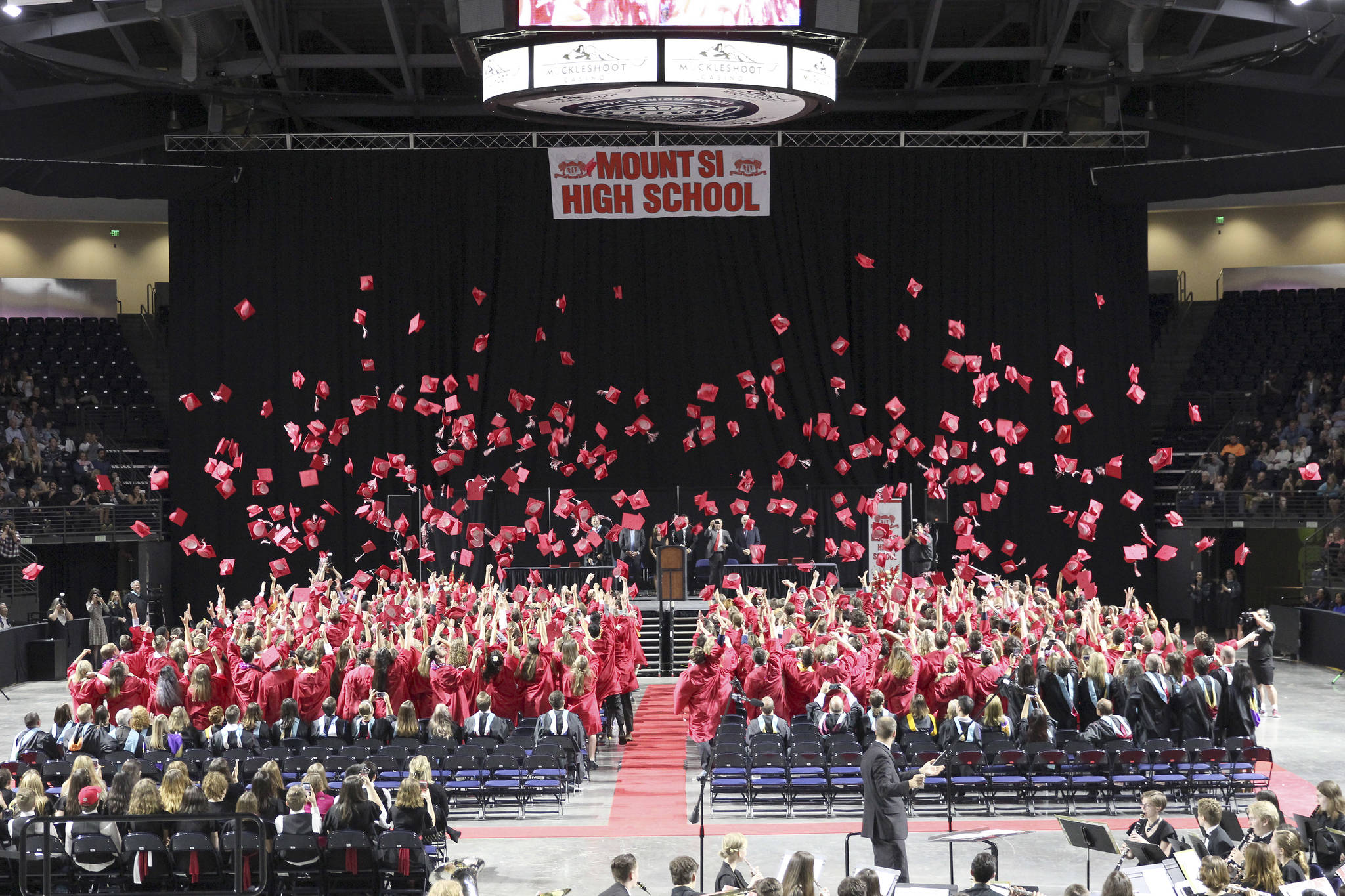 Mount Si High School students toss their hats after the graduation ceremony. Photo courtesy of Mount Si High School