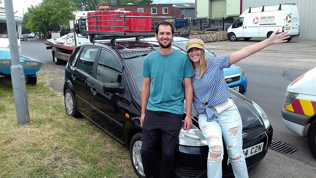 Jake and Madison Leland pick up their “trusty steed,” a 1998 Ford Fiesta, in the United Kingdom. Photo courtesy of Jake and Madison Leland.