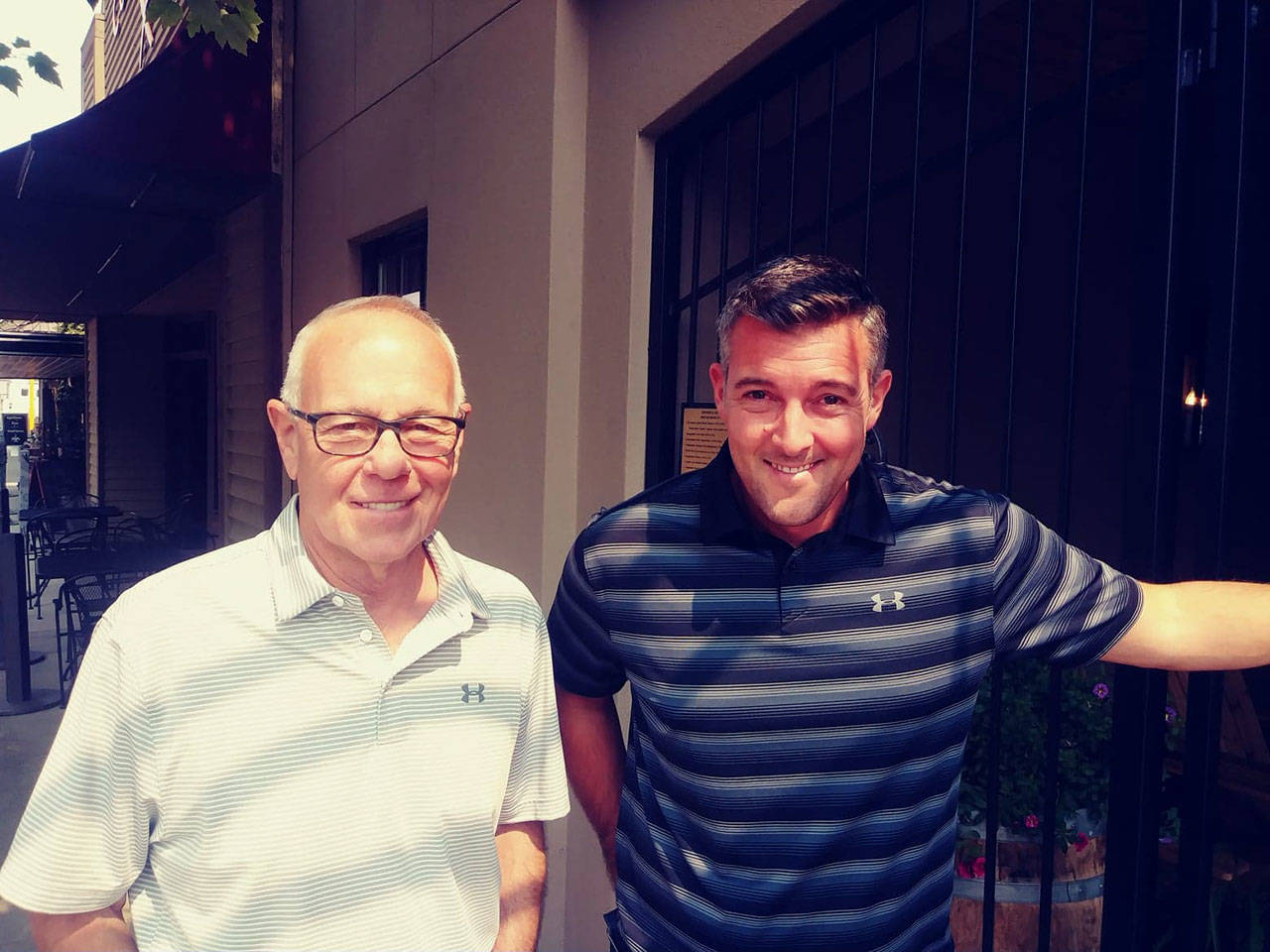 Mike Seal, left, and his son Ryan are owners of the Sigillo Cellars winery which is hoping to build a new production facility in downtown Snoqualmie. Aaron Kunkler/staff photo