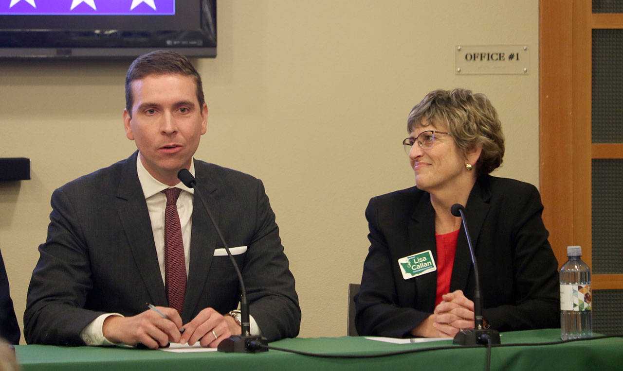 Incumbent candidates Paul Graves and candidate Lisa Callan answer questions regarding Mental Health access in the district. Evan Pappas/Staff Photo
