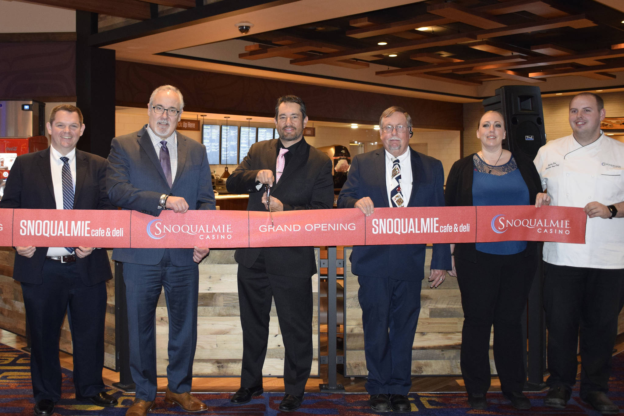 Stakeholders pose during a ribbon cutting ceremony for new deli at Snoqualmie Casino. Courtesy photo