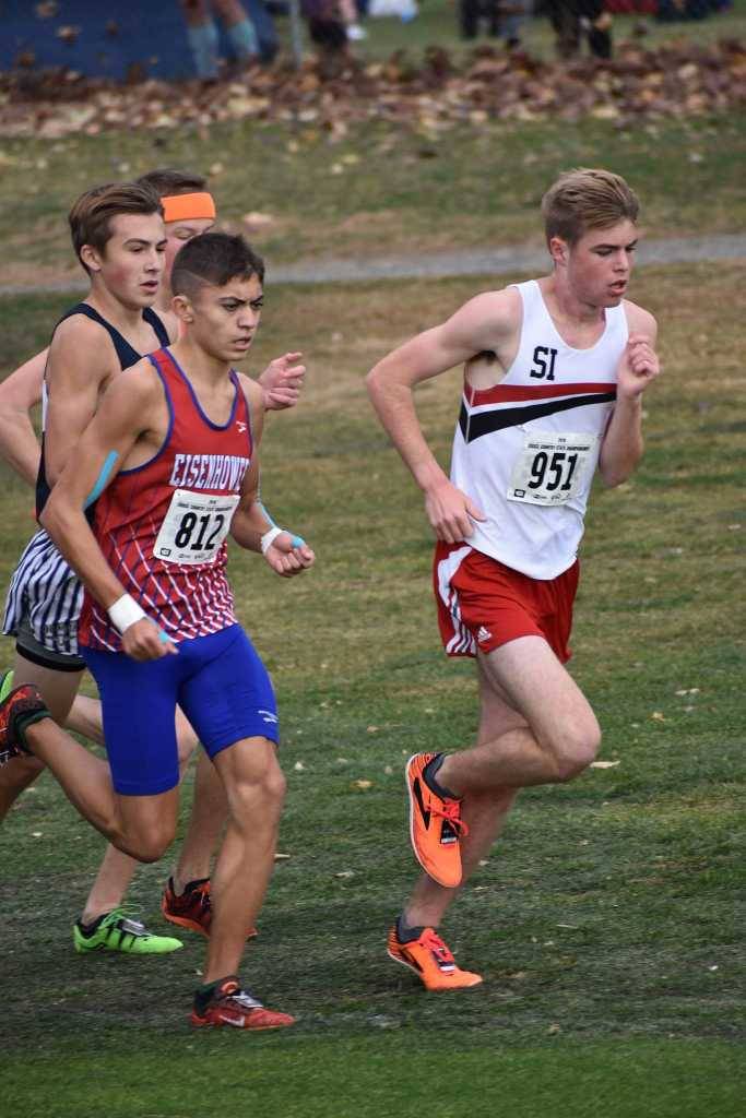 Mount Si High senior Joe Waskom, right, runs to first at the 4A state cross country meet in Pasco on Saturday. Courtesy photo