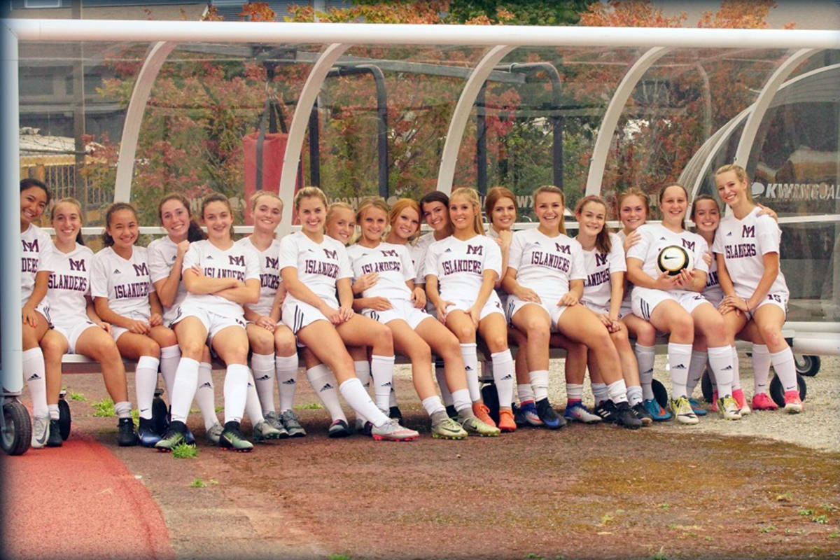 Projects like this soccer shelter, under which members of the Islanders girls soccer team are sitting, have been funded in the community through the Mercer Island Community Fund. The fund is accepting donations now to be put toward 2019 projects.