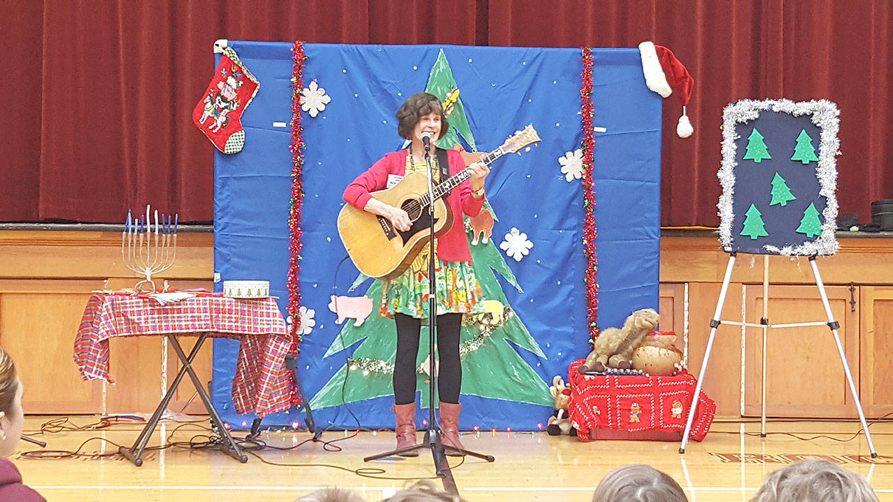 Stewart will preform her concert series, “A Season for Singing” in various libraries throughout King County. She started off the holiday season with a concert in Skykomish on Nov. 16. Families can visit the KCLS website to find Stewart’s upcoming concerts. Courtesy of Nancy Stewart.
