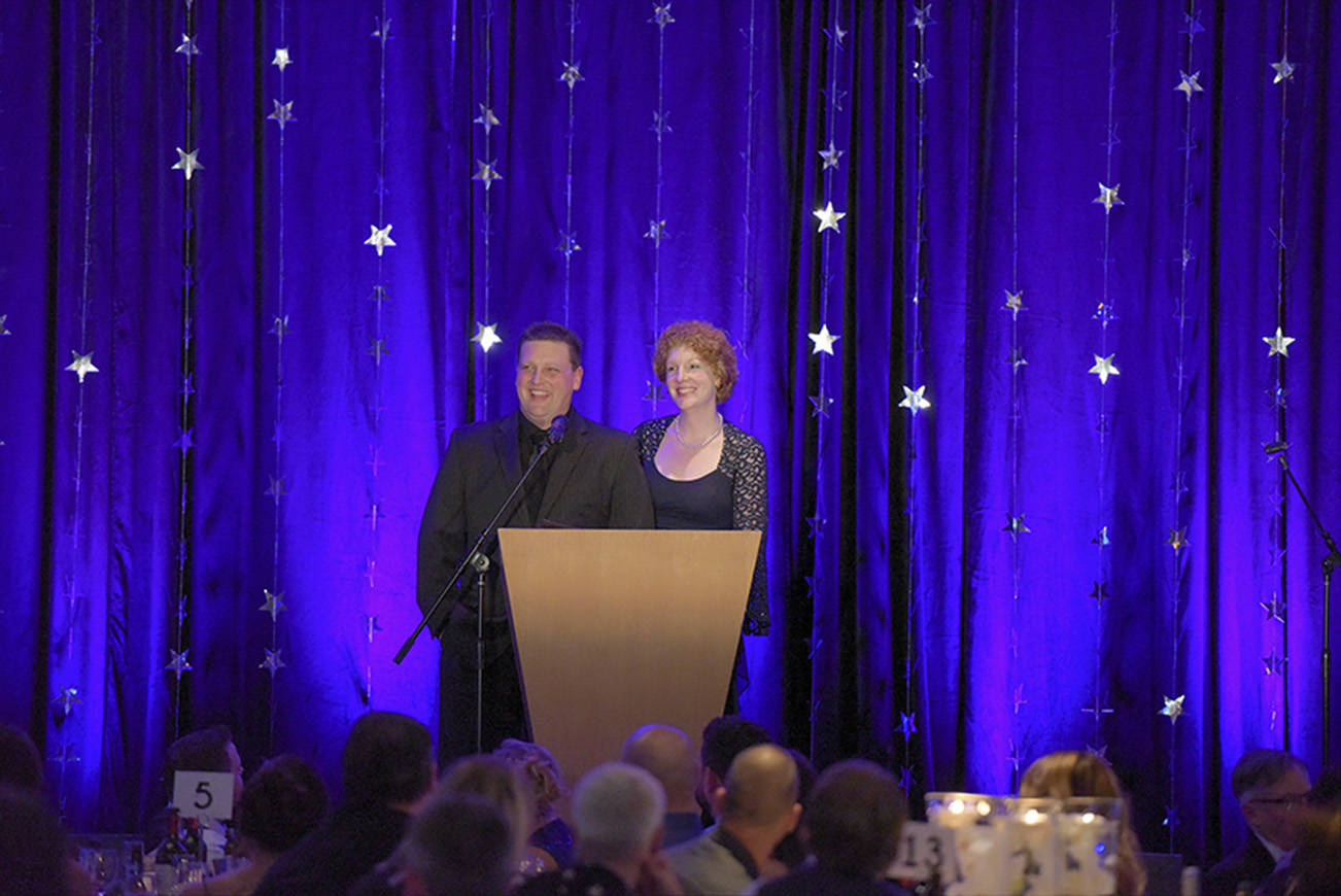 Mark and April Bennett sharing their story with the audience. Photo courtesy of Erik Alston Photography.