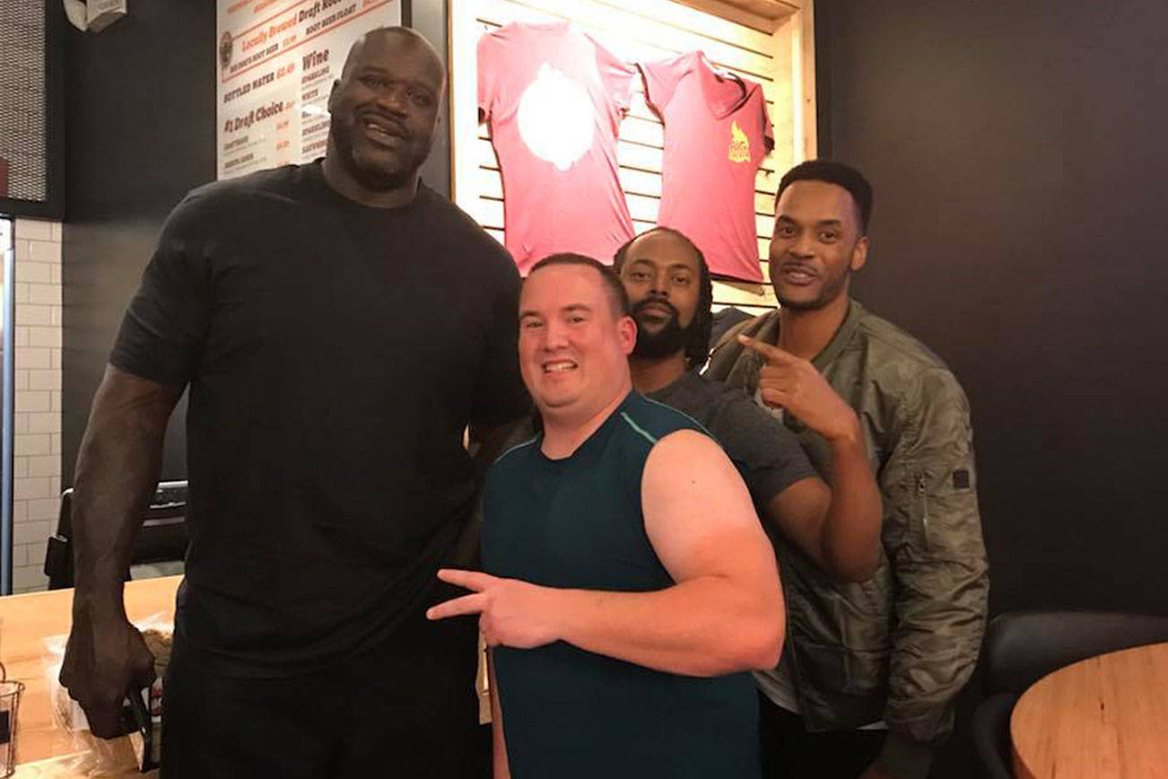 Sportswriter Shaun Scott and his friends Brian Walker and Tony Walker met NBA legend Shaquille O’Neal at Big Chicken restaurant in Las Vegas, Nevada on Nov. 24. Courtesy photo
