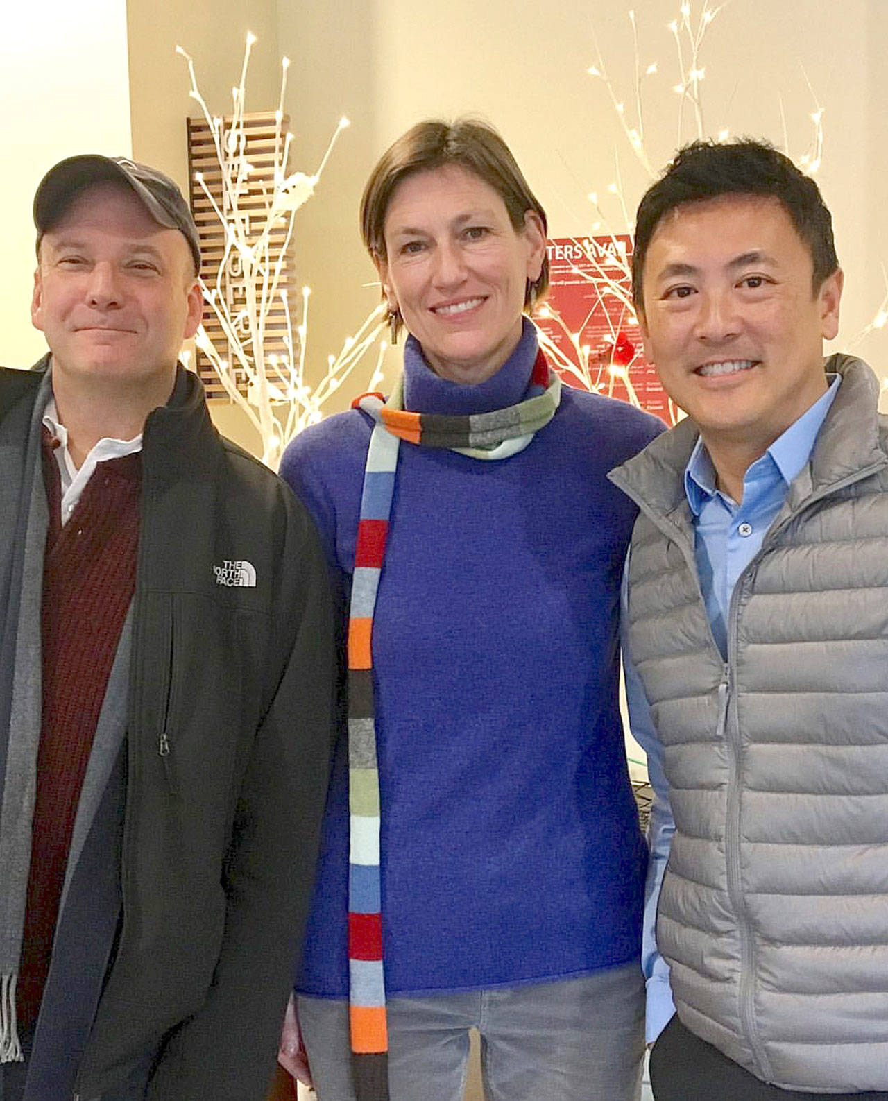 From left, director of local services John Taylor welcomes Danielle de Clercq as deputy director and Jim Chan as director of the permitting division. Photo courtesy of King County Local Services
