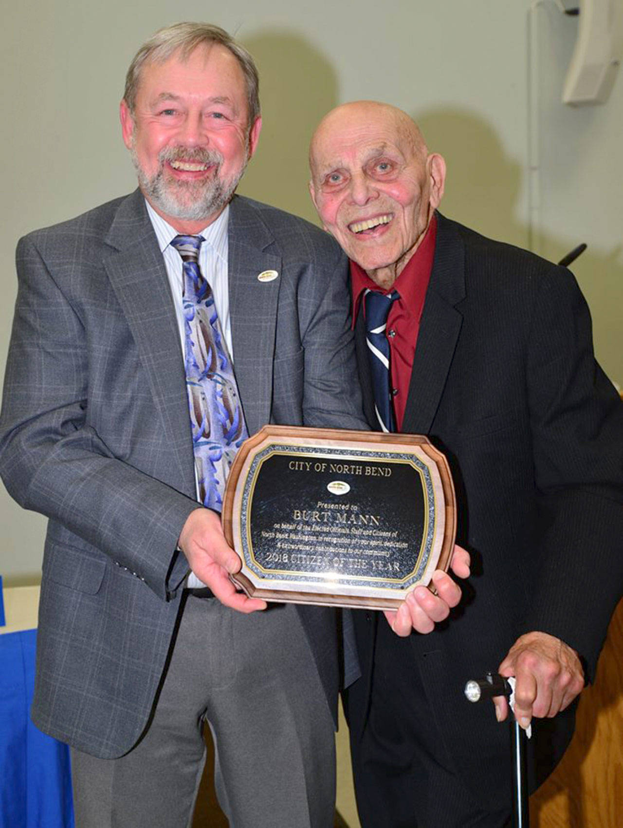 North Bend Mayor Ken Hearing presents Burt Mann with the 2018 Citizen of the Year Award. Courtesy Photo