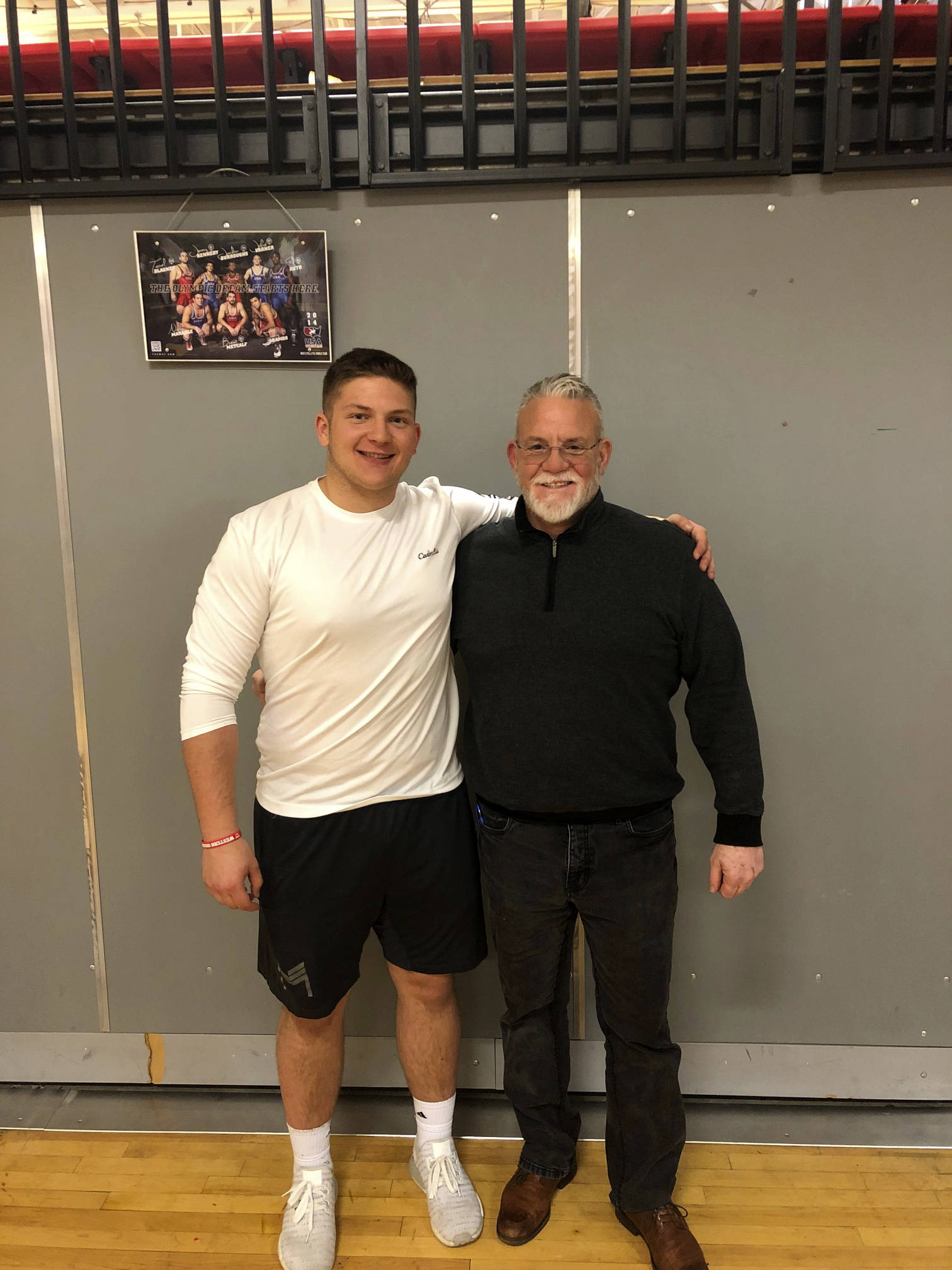 Mount Si Wildcats senior Slater Macko, left, and Mount Si Wildcats head football coach Charlie Kinnune, right, pose for a quick picture in 2019. Macko will compete in the Washington State Coaches Association all-state game this July. Photo courtesy of Charlie Kinnune