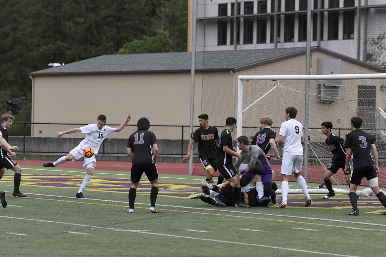 Mount Si sophomore Sully Smith (No. 16) scores a goal in the 39th minute, giving Mount Si a 2-0 lead against the Issaquah Eagles. Mount Si defeated Issaquah, 3-2, in the 4A state quarterfinals on May 18 at Gary Moore Stadium in Issaquah. Photo courtesy of Calder Productions