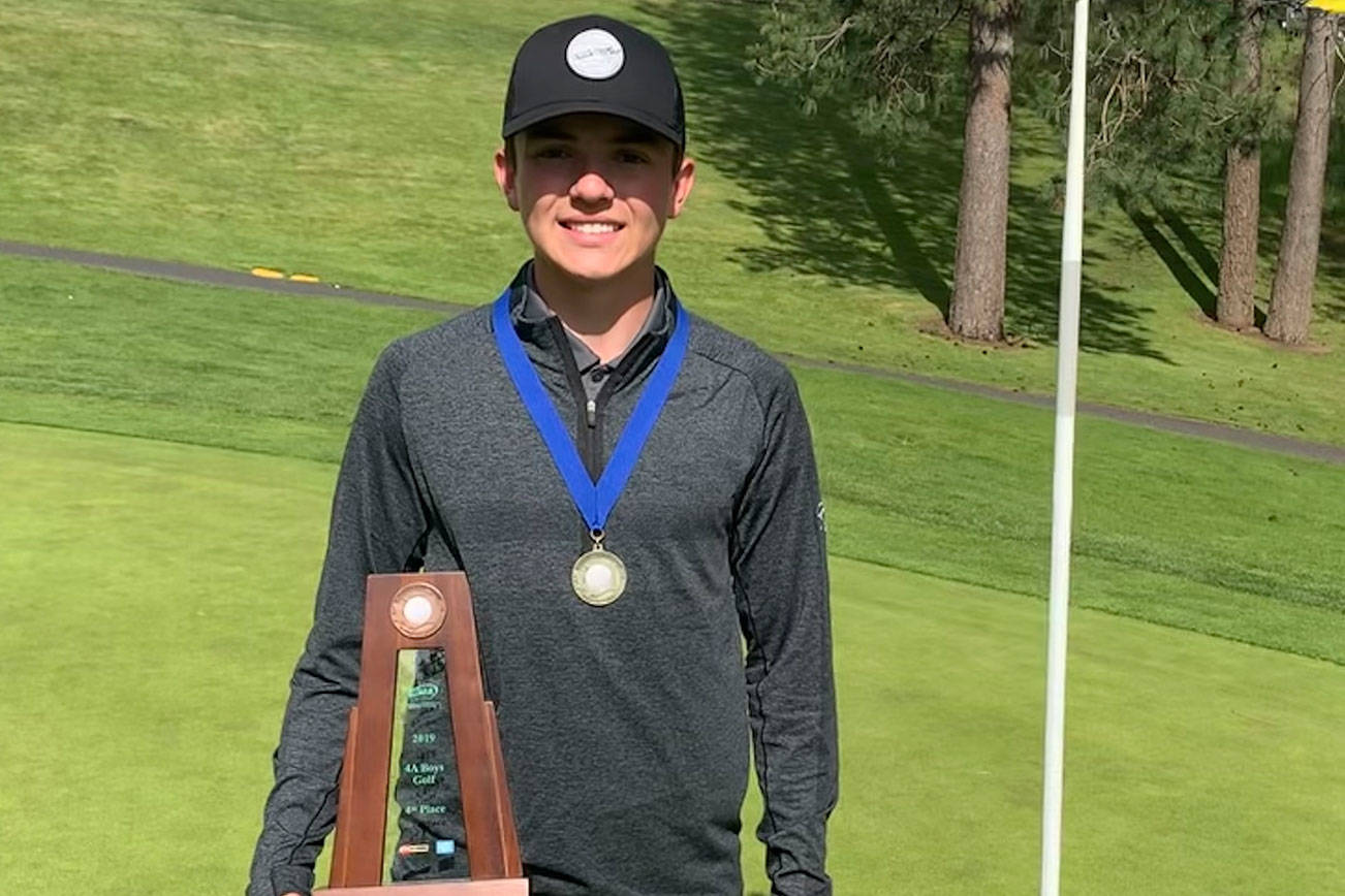 Warford repeats as state golf champion