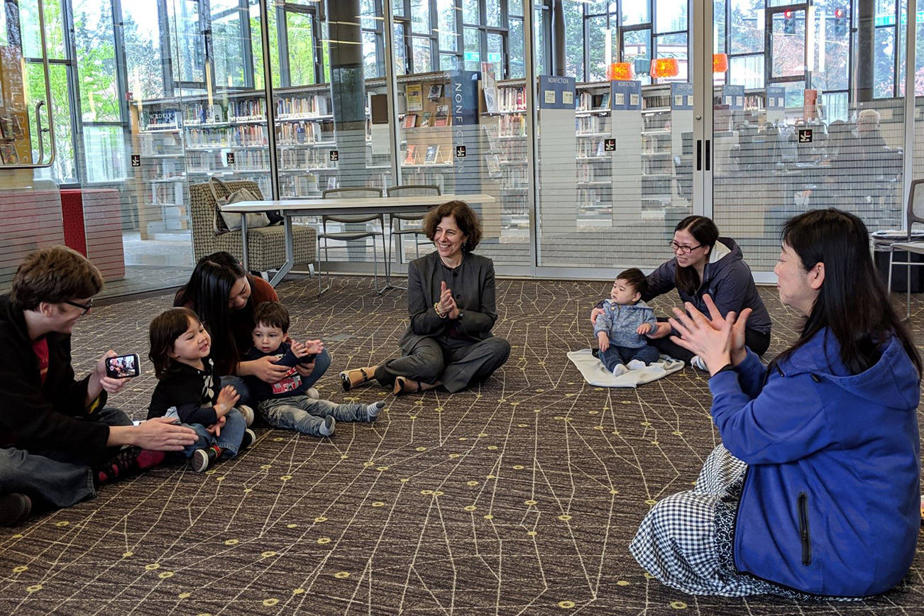 Courtesy photo                                King County Library System executive director Lisa Rosenblum participates in a library Story Time event.