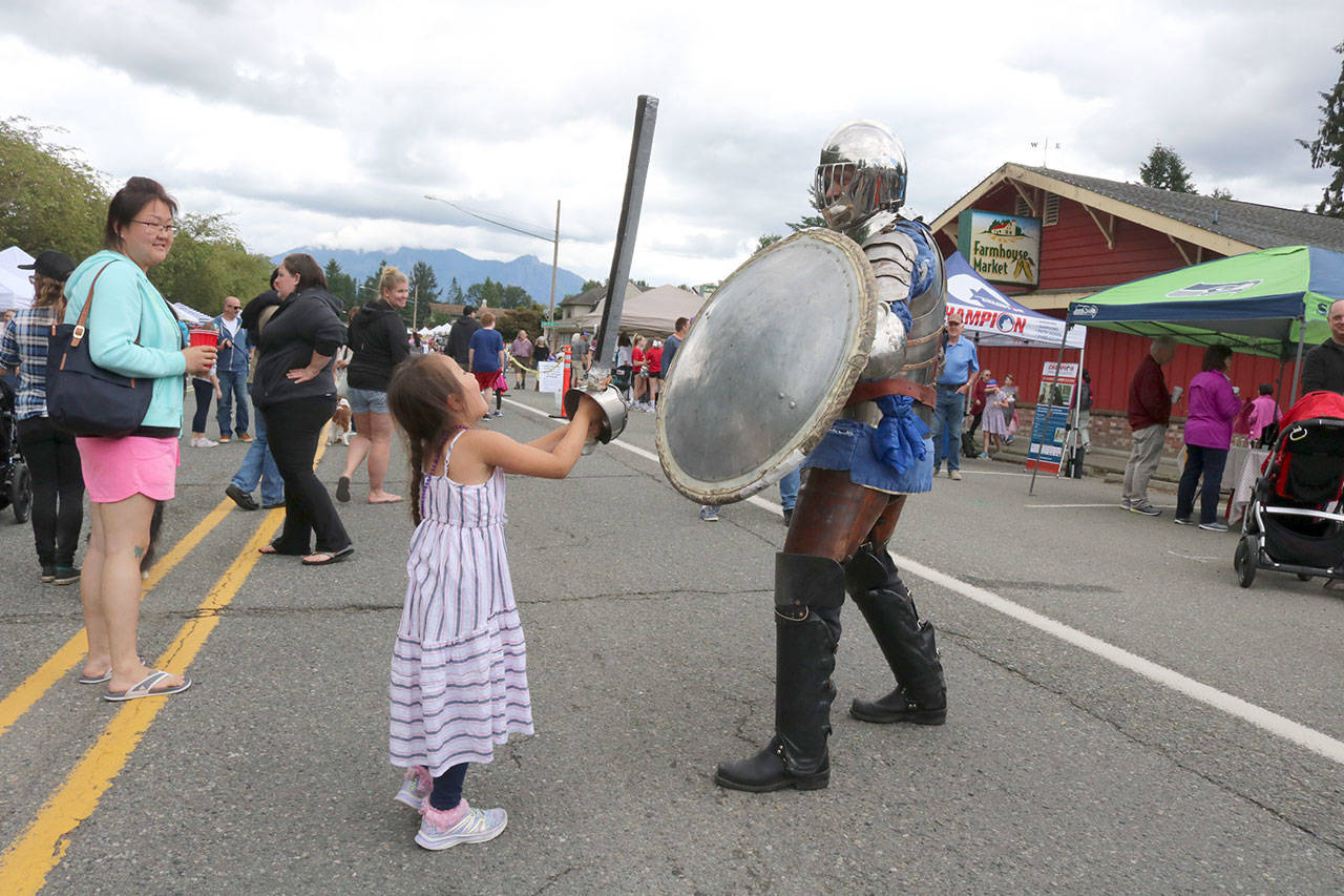 Maya Dibiase of Kirkland tests her strength against a Knight’s shield. Evan Pappas/Staff Photo