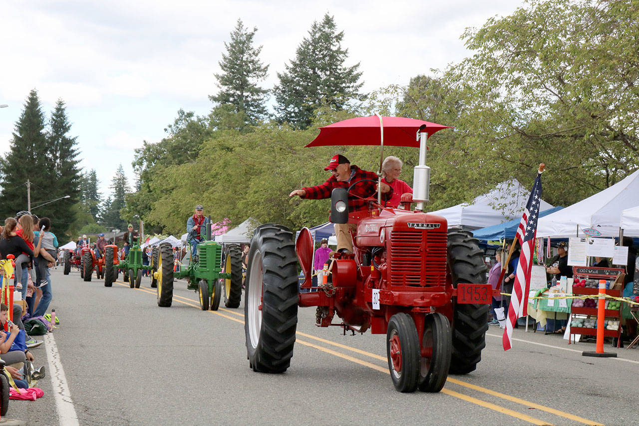 The Northwest Vintage Tractor Club is the final group in the parade. Evan Pappas/Staff Photo