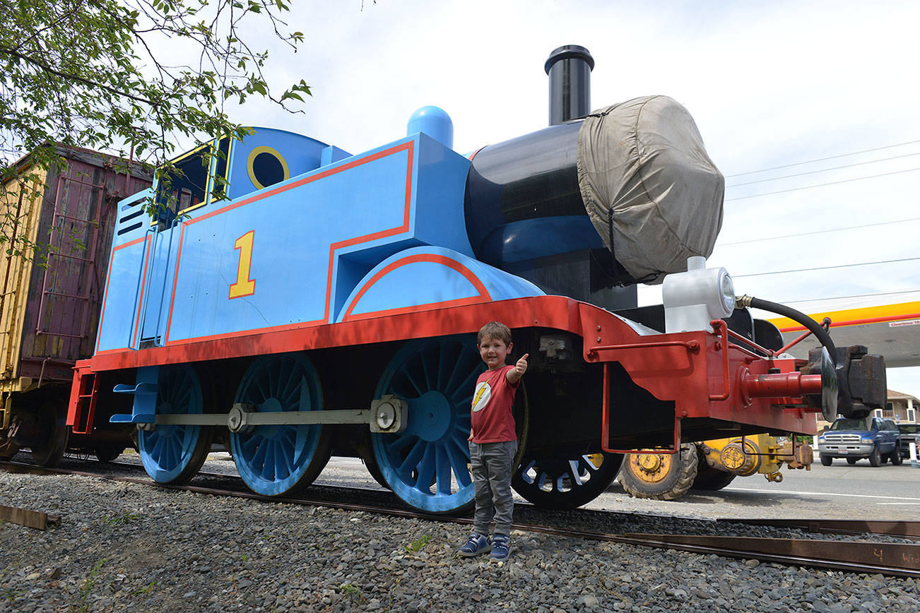 Local Thomas fan, Otto L., greets his hero as the tank engine arrives in North Bend prior to the July events at the Northwest Railway Museum. Northwest Railway Museum / courtesy photo