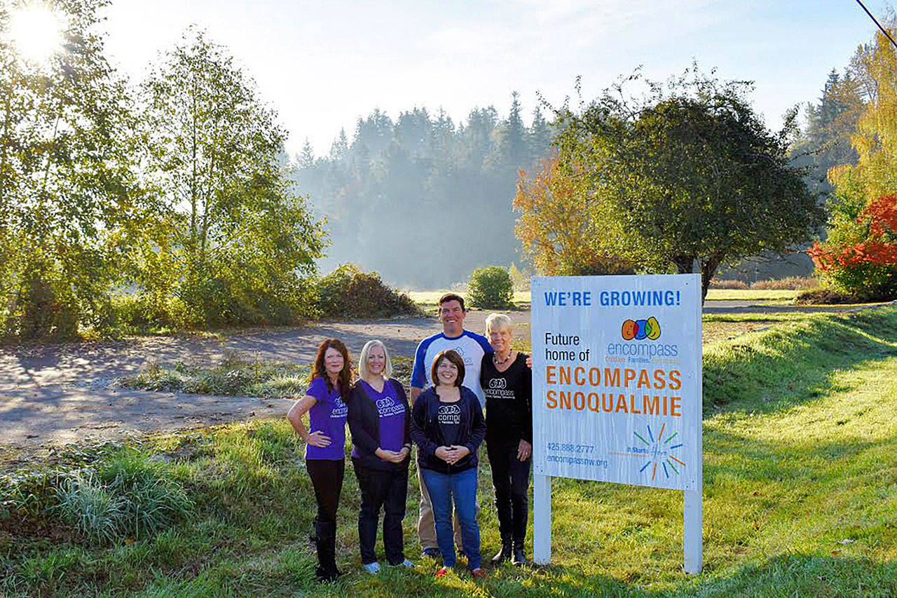 Encompass capital campaign leadership at the property site for Encompass Snoqualmie. From left: Major Gifts Officer, Rhonda Ender, Director of Development, Lisa Yamasaki, Executive Director, Nela Cumming, and Campaign Steering Committee Co-Chairs Brad Hutt and Charlotte Rempfer. Courtesy photo