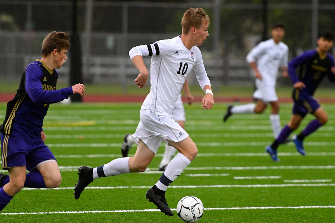 Mount Si Wildcats 2019 graduate Jared Davies carries the ball up the field in the 4A state championship game against the Puyallup Vikings. Davies will continue his soccer career at Pacific Lutheran University in Parkland. Photo courtesy of Calder Productions