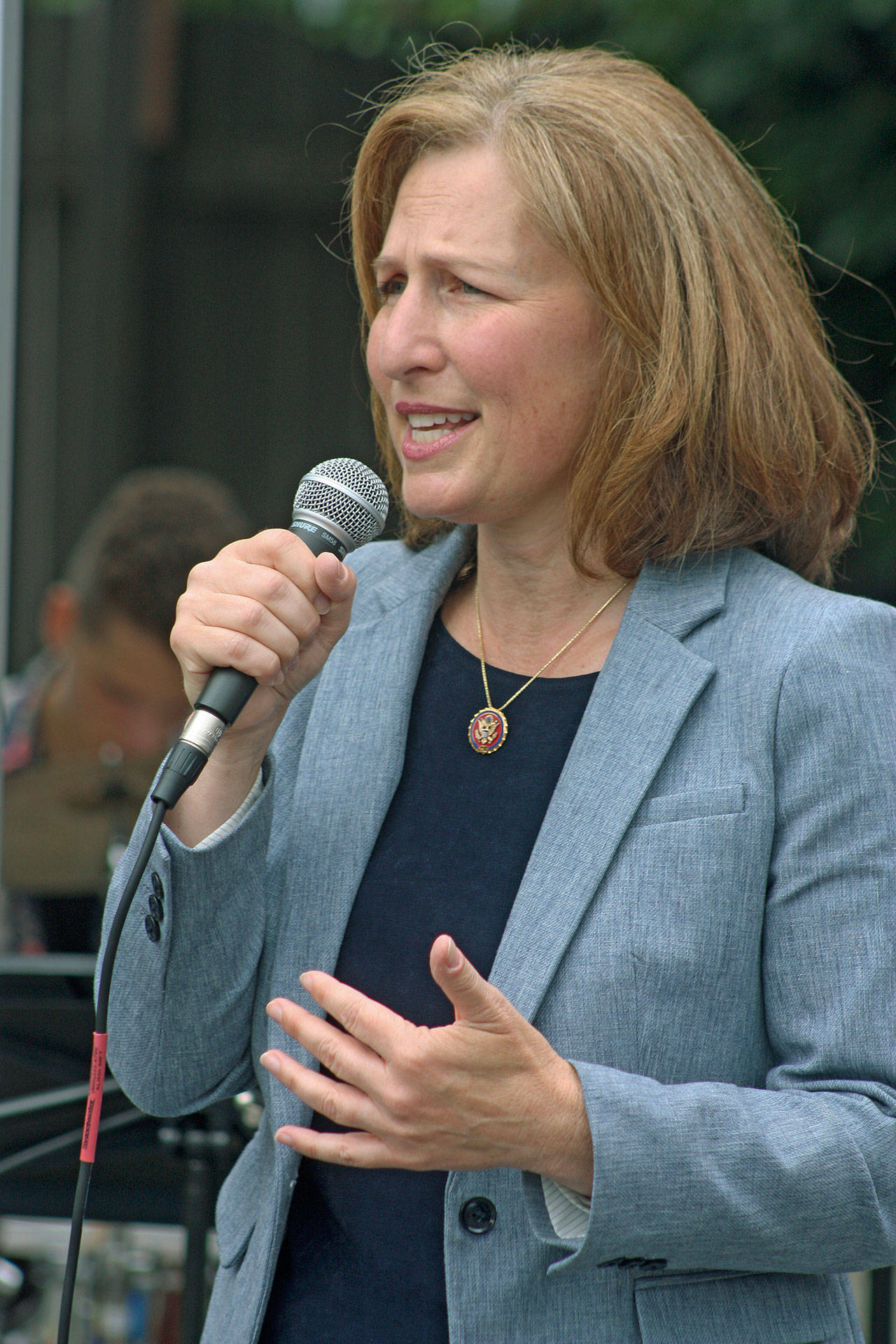 U.S. Rep. Kim Schrier, D-Wash., speaks to a gathering outside HealthPoint Auburn North on Thursday afternoon. The Congresswoman talked about the importance of childhood immunizations. MARK KLAAS, Auburn Reporter