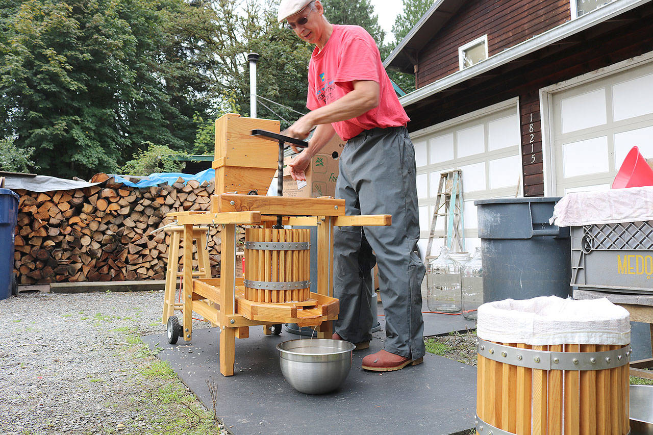 Greg Giuliani uses a custom-designed cider press to make his cider. Giuliani will demonstrate the process at Carnation Farms’ Harvest Fest in October.