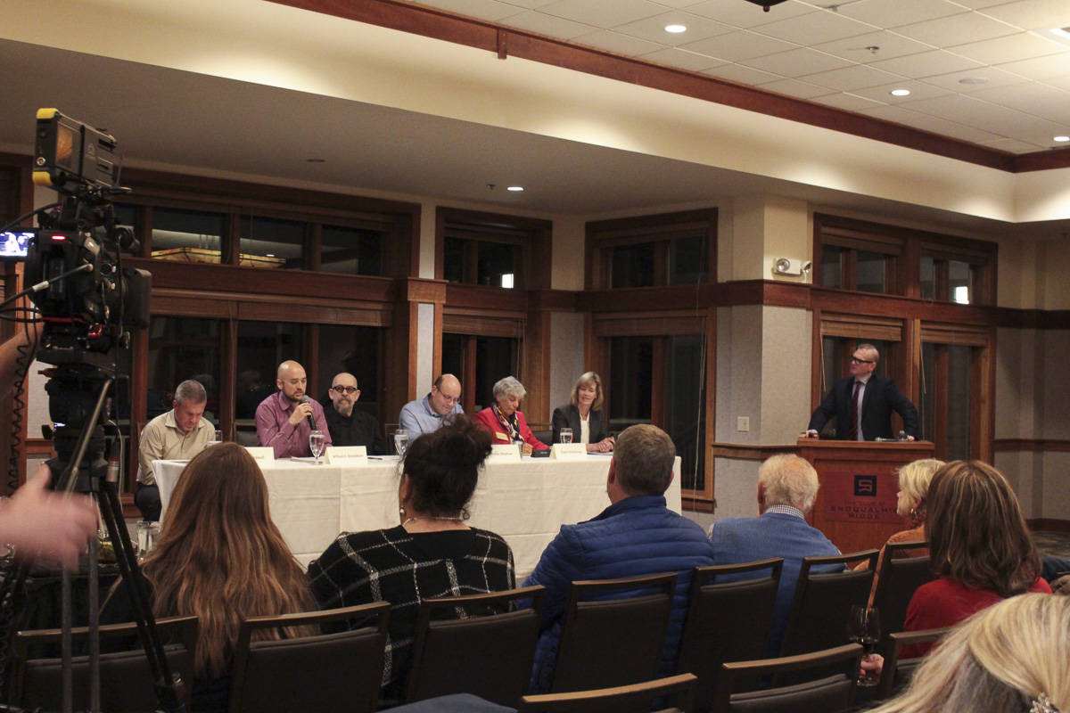 Natalie DeFord/staff photo                                From left, Snoqualmie city council candidates incumbent Sean Sundwall, William Donaldson, Fuzzy Fletcher, incumbent James Mayhew, Elaine Armstrong and incumbent Katherine Ross, and moderator Jonas Means of SnoValley Chamber at a forum on Oct. 9.