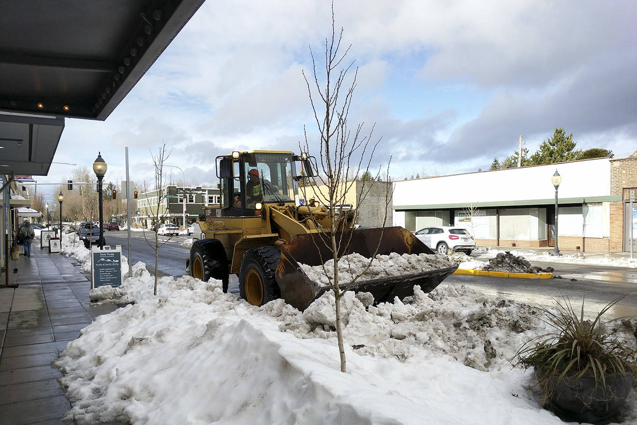 Heavy equipment was used throughout the Valley to clear snow from downtown hubs in February 2019. Corey Morris/Staff photo