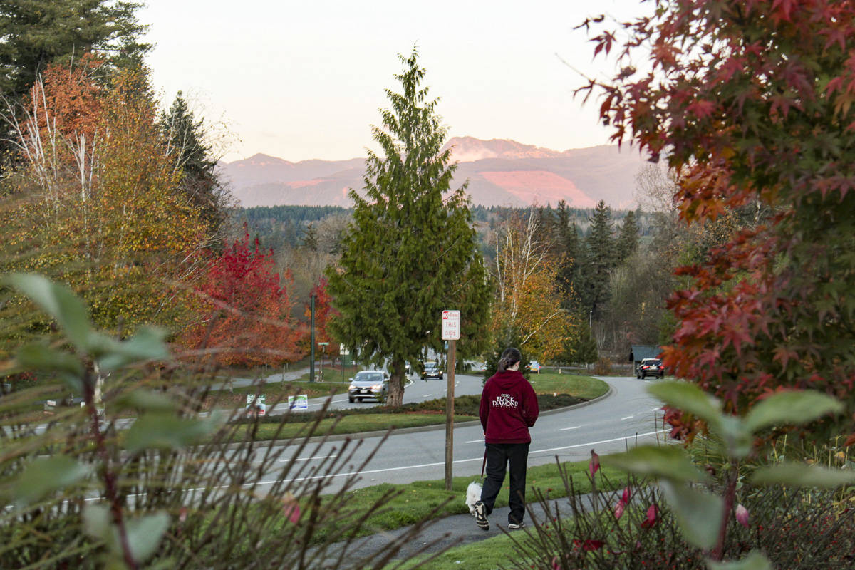 Someone walks along Snoqualmie Parkway on Oct. 28. Staff photo/Natalie DeFord