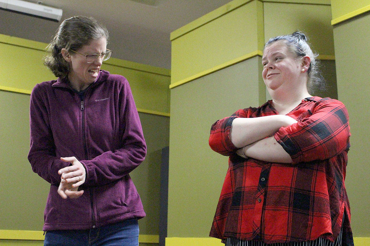 Lucy Adams and Renee Lystad rehearse for VCS’s production of “A Christmas Carol” on Nov. 19. Madison Miller / staff photo